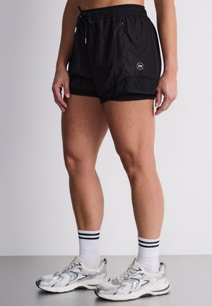 UNITA - Pantaloni sportivi - nero