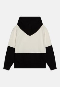 Felpa con cappuccio dal design a blocchi di colore in crema, nero e grigio. Presenta una texture a maglia e polsini e orlo a coste.