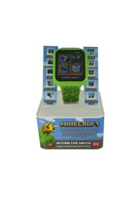 Montre interactive verte inspirée de Minecraft avec un écran tactile carré, affichant des icônes. Le bracelet présente des motifs pixelisés et des graphiques colorés.