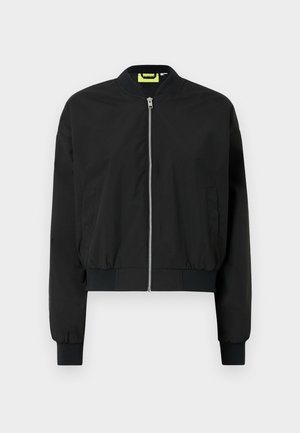 Black bomber jacket with a zip front, ribbed cuffs, and hem. Made of smooth fabric, featuring two side pockets and a round neckline.