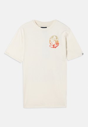 Cream cotton t-shirt with short sleeves and a relaxed fit, featuring a colorful astronaut graphic on the left chest.