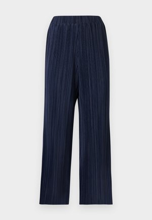 Pantalon large taille haute bleu marine avec de fines plis verticaux et une ceinture élastique sur un fond clair.