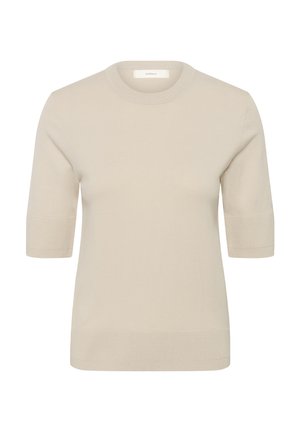 Beež lühikeste varrukatega kootud kampsun soonikkoes ümar kaeluse, mansettide ja äärega, valgel taustal.