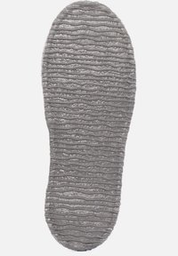 Gray shoe sole with a textured surface featuring wavy lines. The shape is oval, tapering at the toe with prominent grooves for grip.