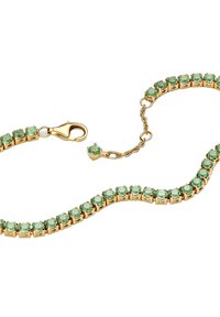 Armbanduhr in Goldoptik, geschmückt mit grünen Edelsteinen, mit einem Linked-Design und einem Karabinerverschluss für sicheren Halt.
