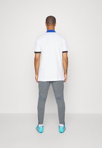 Nike Performance M NK DF ACD TRK PNT KP FP HT - Calças de fato de treino - smoke grey/summit white