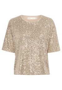 Haut beige à manches courtes couvert de sequins brillants avec un col rond et un ourlet droit.