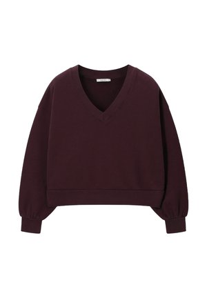 Pull court violet foncé à col en V et manches longues, avec poignets et ourlet côtelés, présenté sur fond blanc.