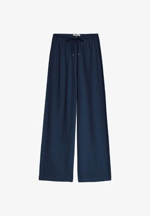 Pantalones de pierna ancha en azul marino hechos de tejido ligero, con cinturilla elástica con cordón y bolsillos laterales para mayor practicidad.
