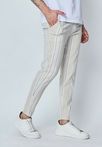 FRILIVIN À RAYURES   - Pantalon classique - beige