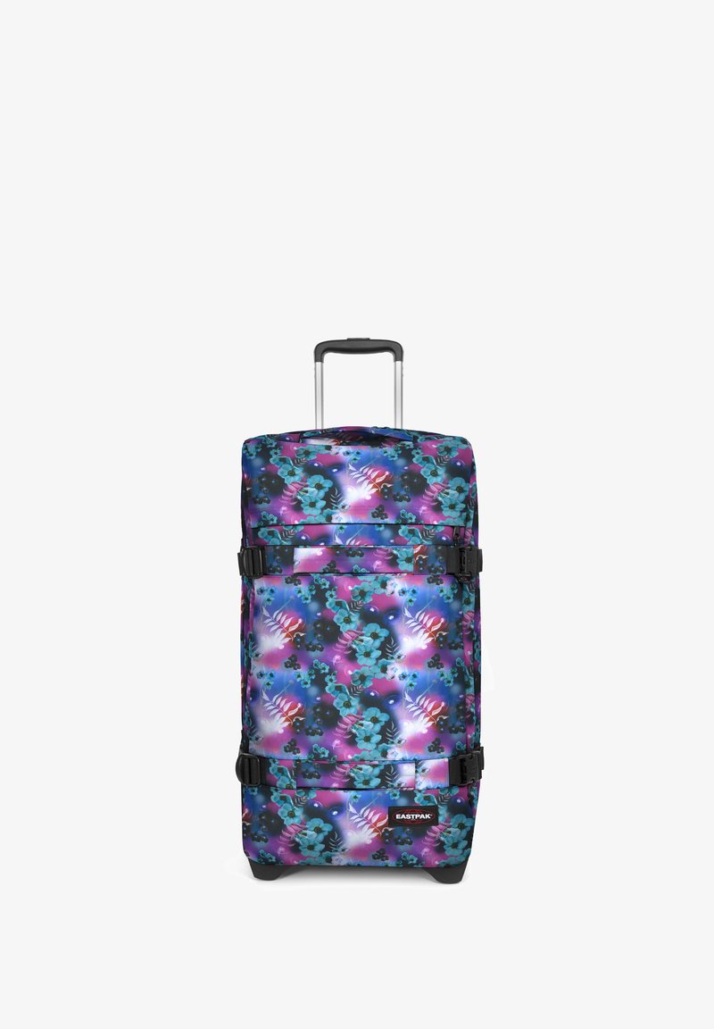 Spinner suitcase with vibrant floral pattern in blue, pink, and purple. Features black straps, a telescopic handle, and wheels.