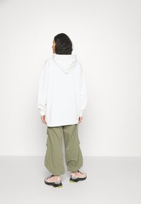 Carhartt WIP HOODED GRAND LOCKER - Sweatshirt - wax