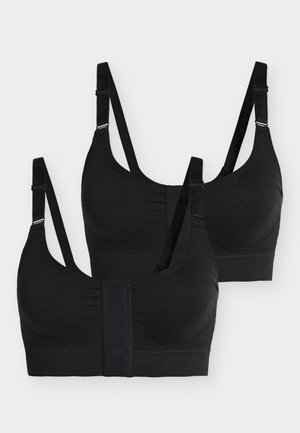 Dva črna brezžična nedrčka z nastavljivimi naramnicami, sprednjim zapiranjem in brezšivnimi košaricami, položena ravno na belem ozadju.