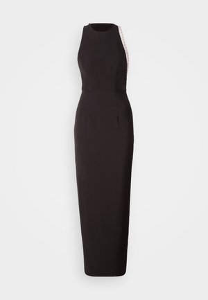 Robe sans manches noire avec une silhouette ajustée, dotée d'un panneau latéral texturé et d'un col rond subtil. Fabriquée en tissu lisse.