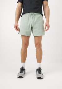 Nike Performance PRIMARY FLEECE - Spordišortsid - jade horizon