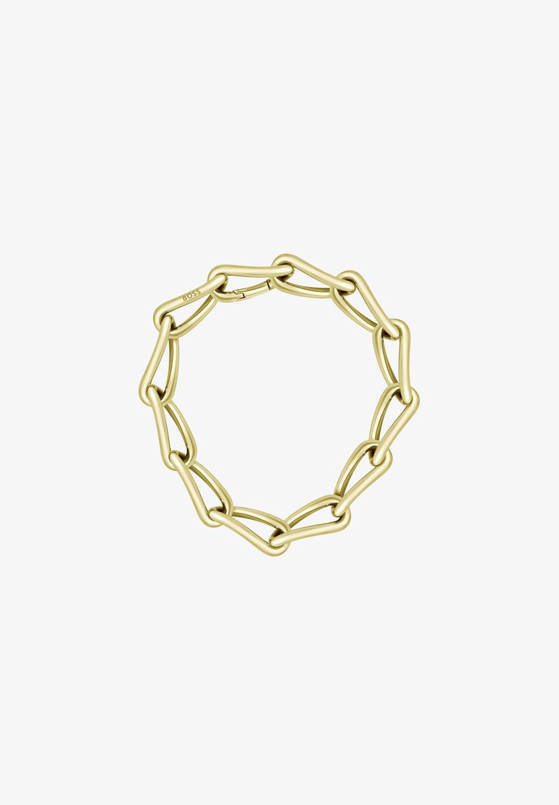 Bransoletka z łańcuszka w kolorze złotym z połączonymi owalnymi ogniwami, gładka tekstura i pewne zapięcie. Minimalistyczny design z nowoczesnym stylem.