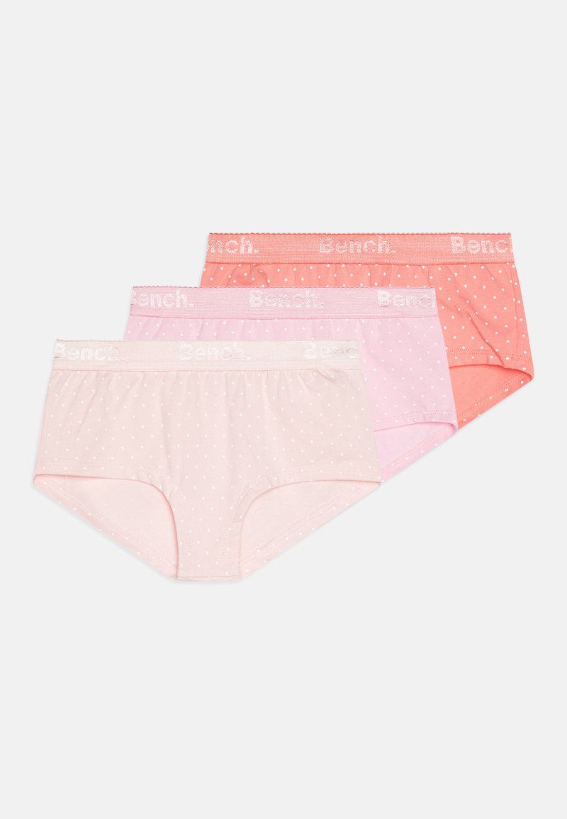 Tres pares de bragas de mujer en suave algodón: rosa claro con puntos blancos, rosa medio y coral, con una cinturilla con logotipo.