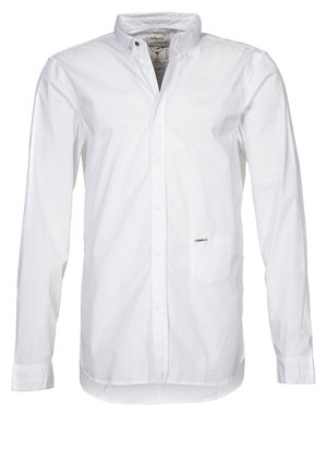 Camicia bianca a maniche lunghe con bottoni, realizzata in cotone morbido. Presenta un colletto appuntito, tasca frontale e un piccolo logo sul taschino.