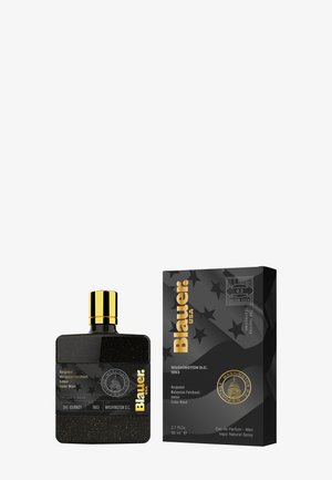 Schwarze Glasflasche mit goldenen Akzenten, die eine strukturierte Oberfläche und eine quadratische Form aufweist. Begleitet von einer rechteckigen schwarzen Box mit einem Sternenmuster.