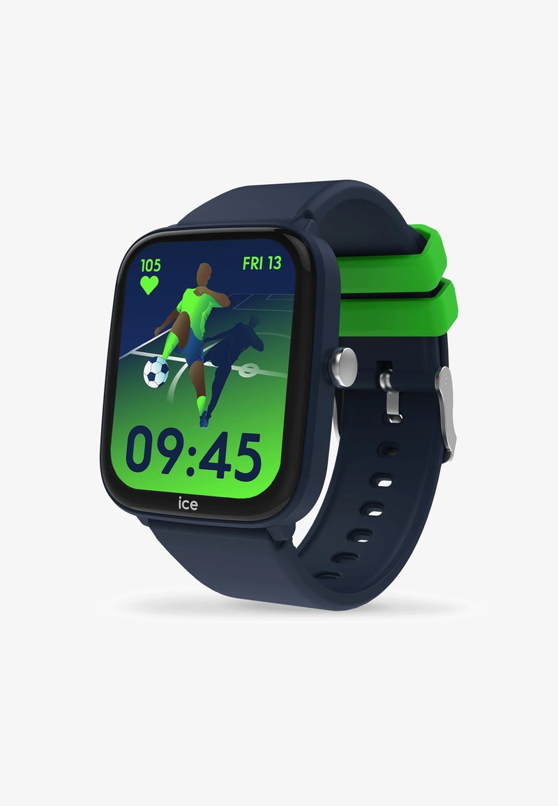 Kvarininis laikrodis su kvadratiniu ciferblatu, tamsiai mėlyna silikono apyranke ir žaliais akcentais. Ekrane rodomas sporto grafikas, laikas ir širdies ritmas.