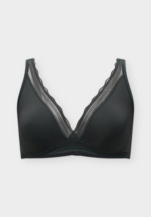 Schwarzer kabelloser BH mit V-Ausschnitt, weichen Cups und transparenten Spitzenbesätzen an den Kanten und Trägern, flach auf einem grauen Hintergrund liegend.