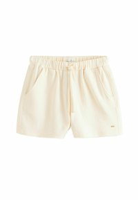 Cremfarbene Shorts aus strukturiertem Stoff mit einem elastischen Taillenbund, Kordelzug und seitlichen Taschen für zusätzliche Funktionalität.