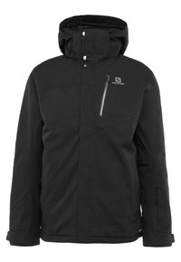 Veste d'hiver noire isolante avec capuche attachée, fermeture éclair avant recouverte par un rabat, poche poitrine zippée, et logo Salomon sur le côté gauche de la poitrine.