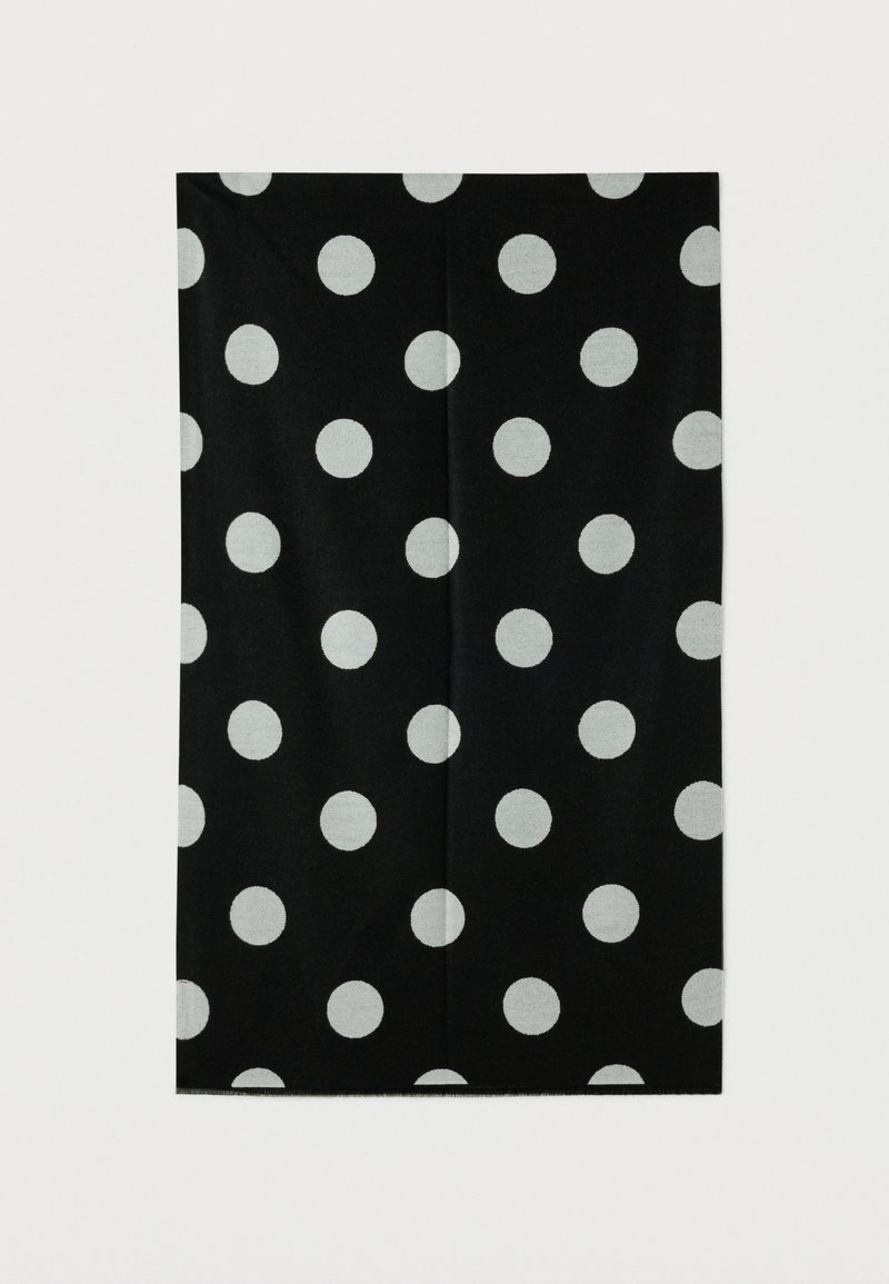 Must tekk suurte hallide täppidega, ristkülikukujuline, pehme tekstuuriga, puhta viimistlusega, ilma nähtavate detailide või aksessuaarideta.