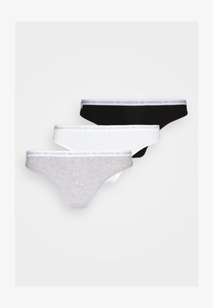 Tre par stringtrosor i grått, vitt och svart. Tillverkade av mjukt tyg med en logotypprydd elastisk midjeband.