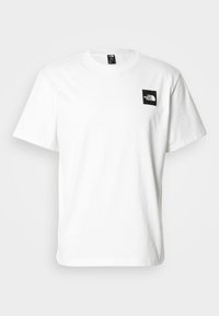 Λευκό βαμβακερό t-shirt με μαύρο τετράγωνο λογότυπο στην αριστερή πλευρά του στήθους. Κοντά μανίκια και σχέδιο με στρογγυλή λαιμόκοψη. Λεία υφή.