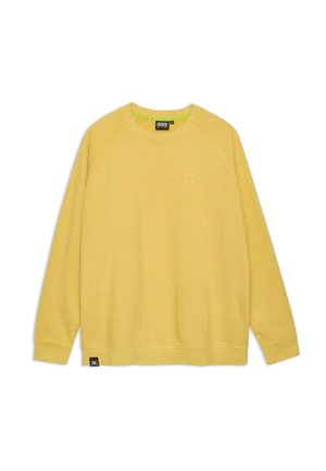 Sweat-shirt jaune à texture douce, manches raglan, col rond, avec un petit logo sur la poitrine. Présente un intérieur contrastant vert.