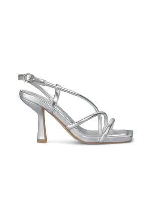 Silver high-heeled sandal with multiple thin straps, square toe design, metallic finish, and a chunky heel for stability.
