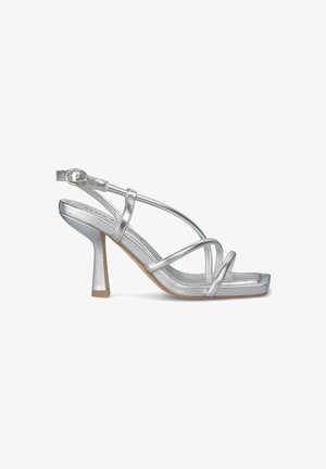 Zilveren hoge sandaal met meerdere dunne bandjes, ontwerp met vierkante neus, metallic afwerking en een chunky hak voor stabiliteit.