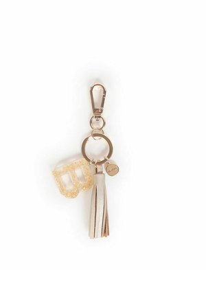 Portachiavi con lettera "B" in glitter oro, una frangia in ecopelle beige e un gancio e anello in tonalità argento per il fissaggio.