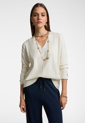 CON SCOLLO A V - Jumper - bianco