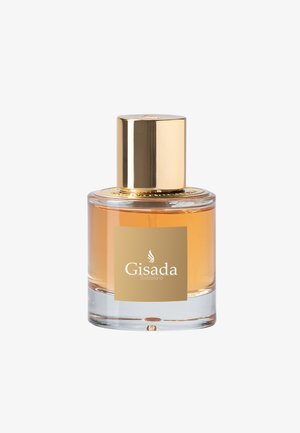 Heldere glazen parfumfles met een gouden dop. De vloeistof is amberkleurig, en het etiket heeft een gouden achtergrond met witte tekst.