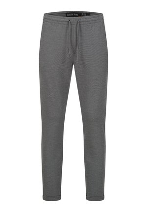 Pantaloni jogging grigi realizzati in tessuto morbido, dotati di una vita elasticizzata con coulisse, gambe affusolate e orli a costine. Finitura testurizzata.