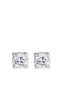Boucles d'oreilles claires en cristal rond, montées sur métal argenté avec des accents à quatre griffes, mettant en avant un design simple et classique.