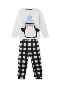 Biała piżama z długim rękawem, na której znajduje się grafika pingwina w jasnoniebieskiej czapce i okularach. Czarno-białe spodnie fleecowe w kratę.