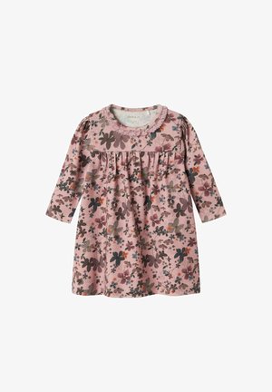 Langærmet kjole i blødt lyserødt bomuld med blomsterprint i mørke og lyse farver. Har en samlet talje og en halsudskæring med blondekant.