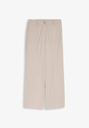 Beżowe spodnie o szerokich nogawkach z bocznymi kieszeniami, szlufkami na pasek i podwójnym zapięciem na guziki w pasie, wykonane z gładkiej tkaniny.