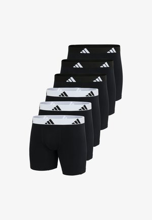Kuusi paria miesten bokserikalsareita mustana ja valkoisena. Valmistettu sileästä, joustavasta materiaalista, jossa on erottuvat elastiset vyöt, joihin on painettu logo.