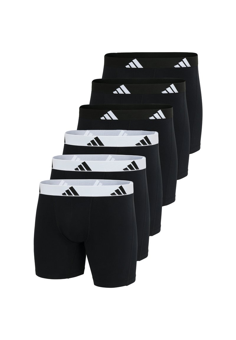 Zes paar herenboxers in zwart en wit. Gemaakt van een soepel, elastisch materiaal met contrasterende elastische taillebanden voorzien van een logo.