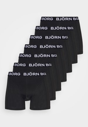 Svarte boxertruser ordnet i en rekke, med hvit elastisk linning med "BJÖRN BORG"-logo. Materialet ser glatt og strekkbart ut.