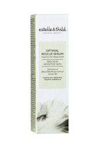 Estelle & Thild Optimal Rescue Serum emballasje, høy rektangulær boks, teksturert hvit bakgrunn, grønne aksenter, svart tekst, og blomsterdesignelement.