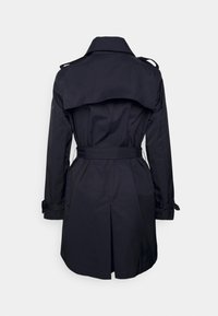 Navy trench coat with a belted waist, rear pleat, large collar, and shoulder epaulettes. Smooth fabric with a sleek, structured design.