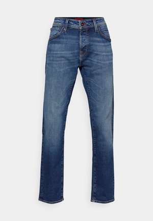 Dark blue denim jeans with a straight cut, featuring a front zipper and button closure, five pockets, and subtle stitching details.