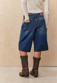 BDG Urban Outfitters Kratke hlače od trapera - light vintage