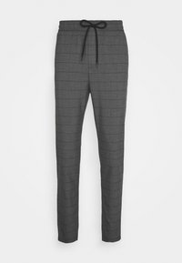 Gray plaid trousers with an elastic waistband, adjustable drawstring, and tapered legs. Smooth texture, featuring a subtle check pattern.