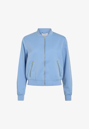 Zils bomber jakas ar rāvējslēdzēja priekšpusi, elastīgām piedurknēm un apakšmalu. Tajā ir divas rāvējslēdzēja sānu kabatas un mīksta, gluda tekstūra.